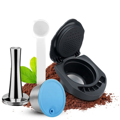 Reusable coffee adapter #1 with temper and ground coffee capsule, on a bed of ground coffee.