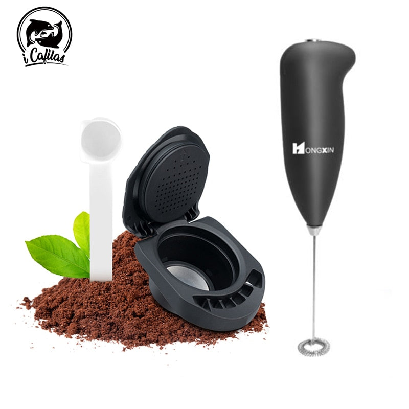 Coffee adapter #1 with milk frother, surrounded by ground coffee.